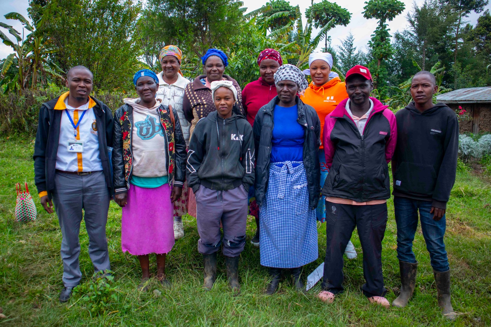 Kenyan women's Chama group meeting discussing financial goals